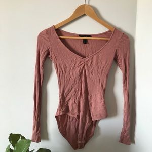 dusty rose body suit